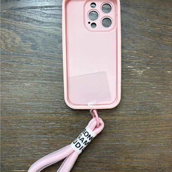 Pink iPhone 15 pro case with wristlet strap - Picture 2 of 2